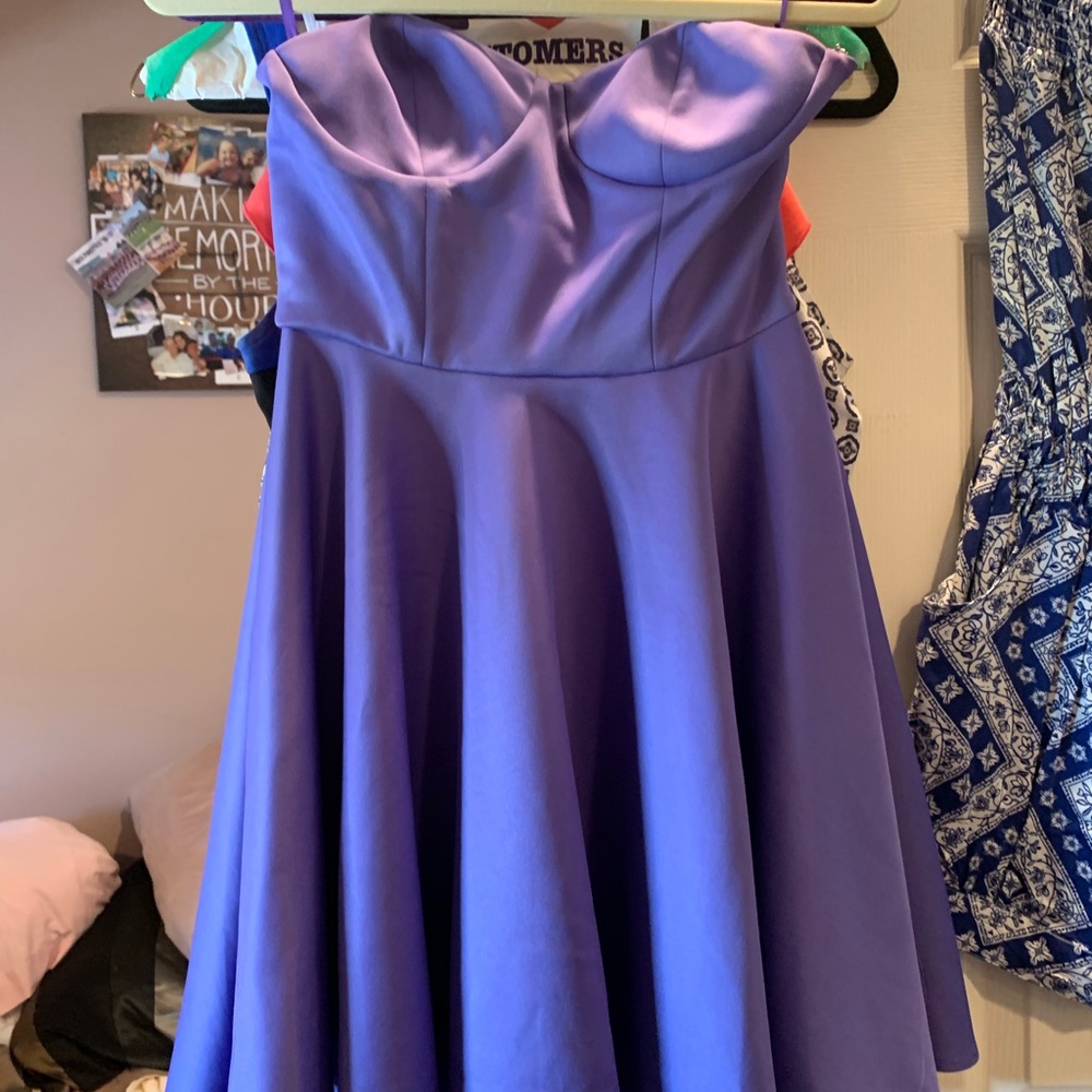 Purple strapless knee length dress